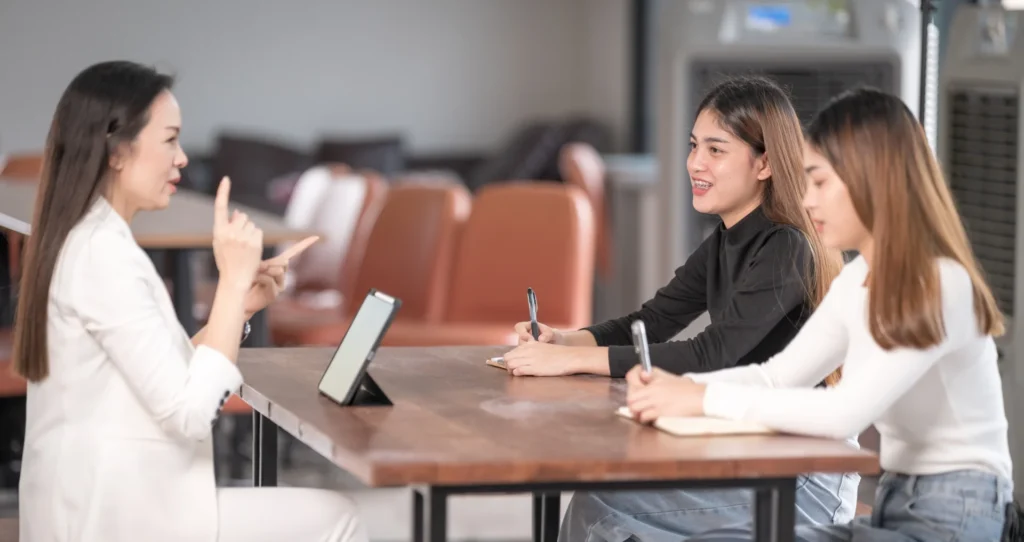 Students consulting with a UK education agent for study abroad guidance